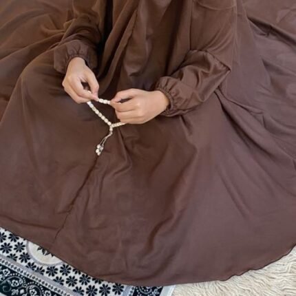 a Kid wearing plain namaz chadar with sleeves for offering prayers
