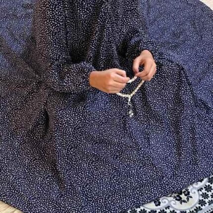 a Kid wearing namaz chadar with sleeves for offering prayers