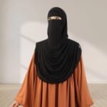 A Women wearing Harmala Hijab & Niqab Set By Clothifydotpk