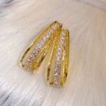 Dazzling Diamond Hooplets Earrings - Find Your Perfect Pair. Crafted with high-quality Rhinestone.
