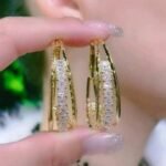 Dazzling Diamond Hooplets Earrings - Find Your Perfect Pair. Crafted with high-quality Rhinestone.