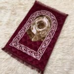 A premium prayer mat with a thick, quilted design for comfort and a non-slip base