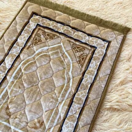 A premium prayer mat with a thick, quilted design for comfort and a non-slip base