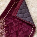 A premium prayer mat with a thick, quilted design for comfort and a non-slip base