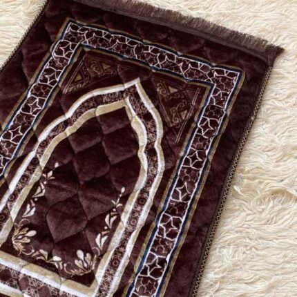 A premium prayer mat with a thick, quilted design for comfort and a non-slip base