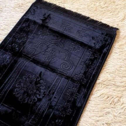 A premium velvet prayer mats with a thick design for comfort and a non-slip base