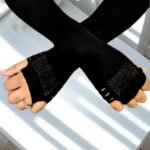 Stretchy, netted fabric arm sleeves.