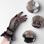 A pair of fancy, imported net gloves featuring a detailed mesh pattern.