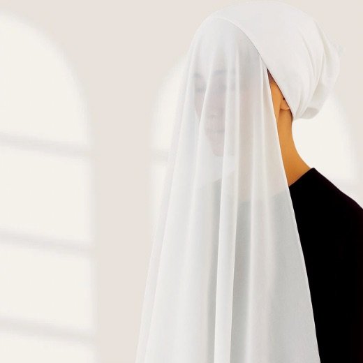 Instant_Hijab-0110 - 3 A woman wearing a ready-to-wear instant chiffon hijab, featuring a soft, flowy drape and pre-stitched design for easy wear with inner under cap. By Clothifydotpk