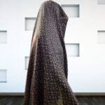 Woman wearing Irani Gol Namaz Chadar