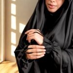 Model wearing Jet black Saudi Jilbab.