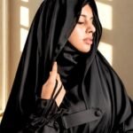 Model wearing Jet black Saudi Jilbab.