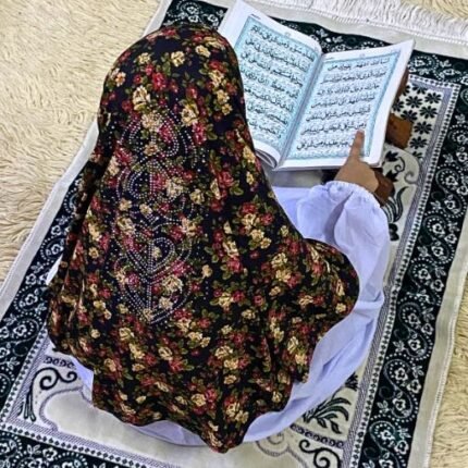 Close-up of a soft, lightweight Fancy Makhna hijab designed for kids namaz with floral print and delicate stone embellishments,featuring secure coverage.