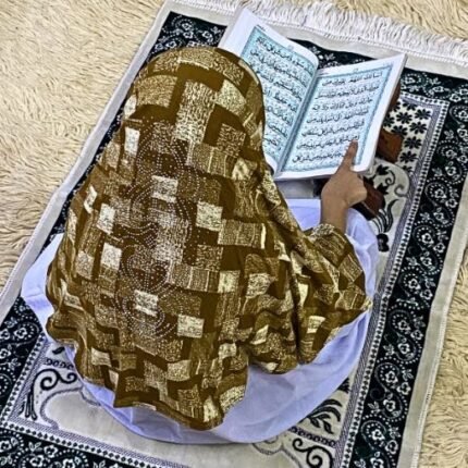 Close-up of a soft, lightweight Fancy Makhna hijab designed for kids namaz with floral print and delicate stone embellishments,featuring secure coverage.