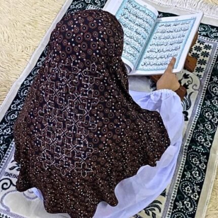 Close-up of a soft, lightweight Fancy Makhna hijab designed for kids namaz with floral print and delicate stone embellishments,featuring secure coverage.