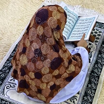 Close-up of a soft, lightweight Fancy Makhna hijab designed for kids namaz with floral print and delicate stone embellishments,featuring secure coverage.