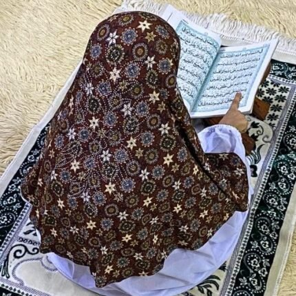 Close-up of a soft, lightweight Fancy Makhna hijab designed for kids namaz with floral print and delicate stone embellishments,featuring secure coverage.