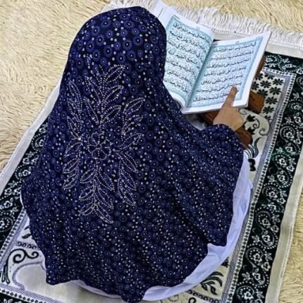 Close-up of a soft, lightweight Fancy Makhna hijab designed for kids namaz with floral print and delicate stone embellishments,featuring secure coverage.
