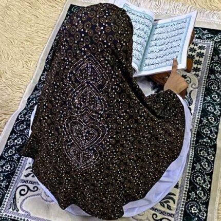 Close-up of a soft, lightweight Fancy Makhna hijab designed for kids namaz with floral print and delicate stone embellishments,featuring secure coverage.
