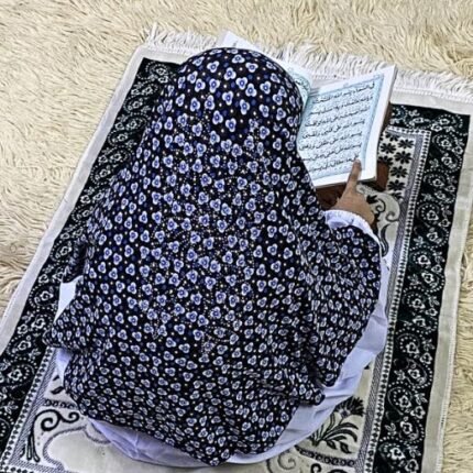 Close-up of a soft, lightweight Fancy Makhna hijab designed for kids namaz with floral print and delicate stone embellishments,featuring secure coverage.