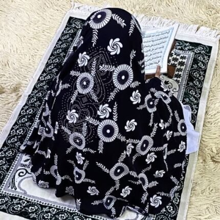 Close-up of a soft, lightweight Fancy Makhna hijab designed for kids namaz with floral print and delicate stone embellishments,featuring secure coverage.