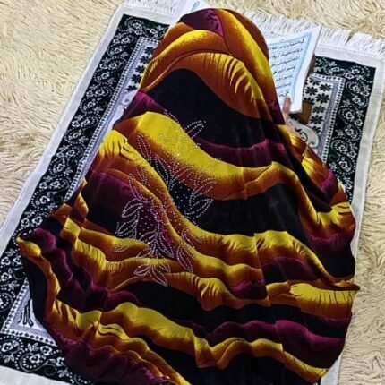 Close-up of a soft, lightweight Fancy Makhna hijab designed for kids namaz with floral print and delicate stone embellishments,featuring secure coverage.