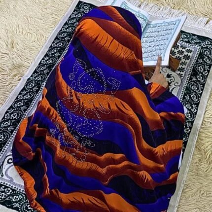 Close-up of a soft, lightweight Fancy Makhna hijab designed for kids namaz with floral print and delicate stone embellishments,featuring secure coverage.