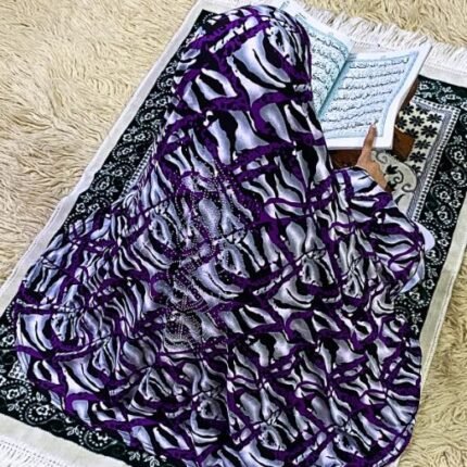 Close-up of a soft, lightweight Fancy Makhna hijab designed for kids namaz with floral print and delicate stone embellishments,featuring secure coverage.