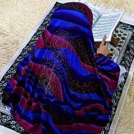Close-up of a soft, lightweight Fancy Makhna hijab designed for kids namaz with floral print and delicate stone embellishments,featuring secure coverage.