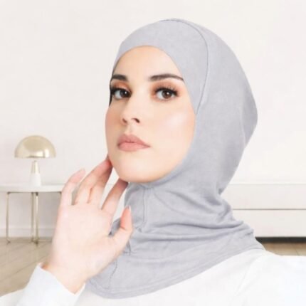 A stretchable, close-fitting hijab undercap designed in a ninja style, covering the head and neck, typically made of breathable fabric like cotton jersey.