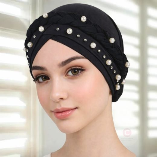 Pearl Turban Hijab Cap012 - 52 A woman wearing a fancy pearl turban hijab cap with delicate pearls, visible under a sheer or light hijab.