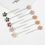 A close-up of a Premium floral Hijab Pin. By Clothifydotpk