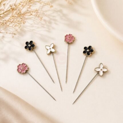 A close-up of a floral Hijab Pin. Clothifydotpk