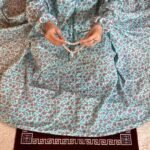 Woman Performing Salah in a Breathable Soft Swiss Lawn full length Namaz Chadar with Pocket By Clothifydotpk