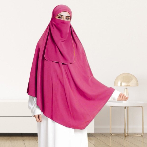 Single_Layer0304 - 48 A woman wearing a long, single layer khimar that drapes over the head, and shoulders, falling to about waist length.