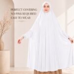 A woman wearing a white jersey Hajj Umrah Scarf with Sleeves, providing full coverage for the head, neck, and shoulders without pins. By CLOTHIFYDOTPK