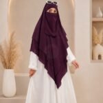 A women wearing flowing Three layer khimar Hijab, made of three separate layers of chiffon. By Clothifydotpk