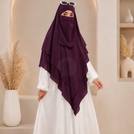 A women wearing flowing Three layer khimar Hijab, made of three separate layers of chiffon. By Clothifydotpk