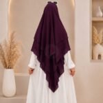 A women wearing flowing Three layer khimar Hijab, made of three separate layers of chiffon. By Clothifydotpk