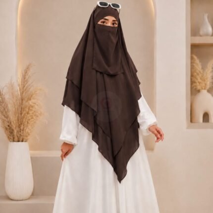 A women wearing flowing Three layer khimar Hijab, made of three separate layers of chiffon. By Clothifydotpk