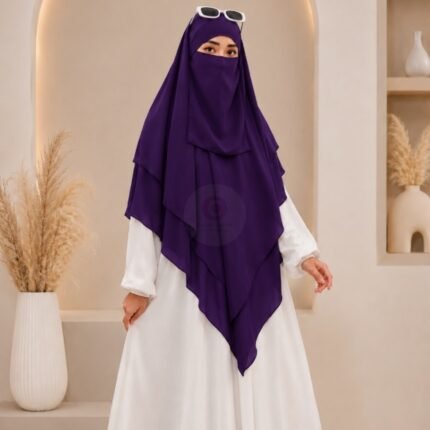 A women wearing flowing khimar 3 layer Hijab, made of three separate layers of chiffon. By Clothifydotpk