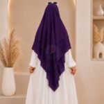 A women wearing flowing khimar 3 layer Hijab, made of three separate layers of chiffon. By Clothifydotpk