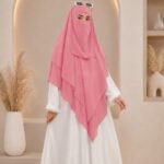 A women wearing flowing khimar three layer Hijab, made of three separate layers of chiffon - Buy Khimar Online Pakistan - By Clothifydotpk