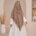 A flowing three layer khimar Hijab, made of three separate layers of chiffon. By Clothifydotpk