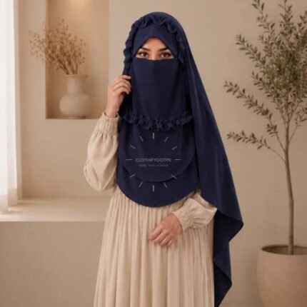 A woman wearing a soft, Chiffon instant Crown hijab with Niqab, draped smoothly around her head and shoulders with no visible pins. BY CLOTHIFYDOTPK