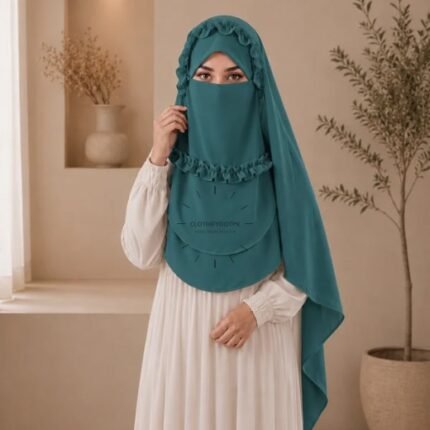 A woman wearing a soft, Chiffon instant Crown hijab with Niqab, draped smoothly around her head and shoulders with no visible pins. BY CLOTHIFYDOTPK