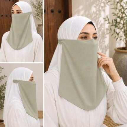 Women Wearing Premium muted olive Elastic Half Niqab - designed with the highest quality, double layered fabric that is comfortable & breathable for modest women. BY CLOTHIFYDOTPK