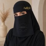 Model wearing breathable lightweight Embroidered Fancy Saudi Niqab with maatha patti and adjustable strings. BY CLOTHIFYDOTPK