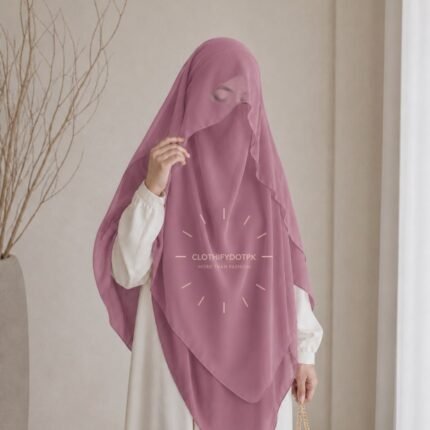 Woman wearing a soft arabic Flap Khimar hijab with Niqab, featuring a front flap overlay for added coverage and graceful movement.