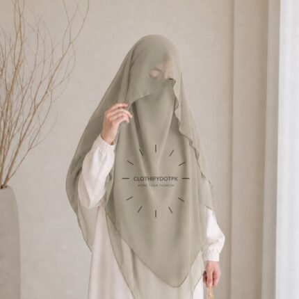 Woman wearing a soft arabic Flap Khimar hijab with Niqab, featuring a front flap overlay for added coverage and graceful movement.